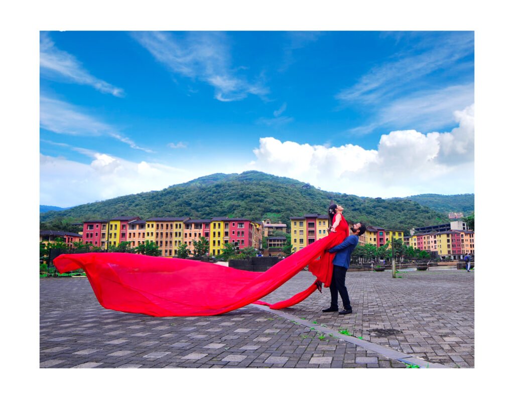 Photographer capturing a couple's romantic moment in Lavasa